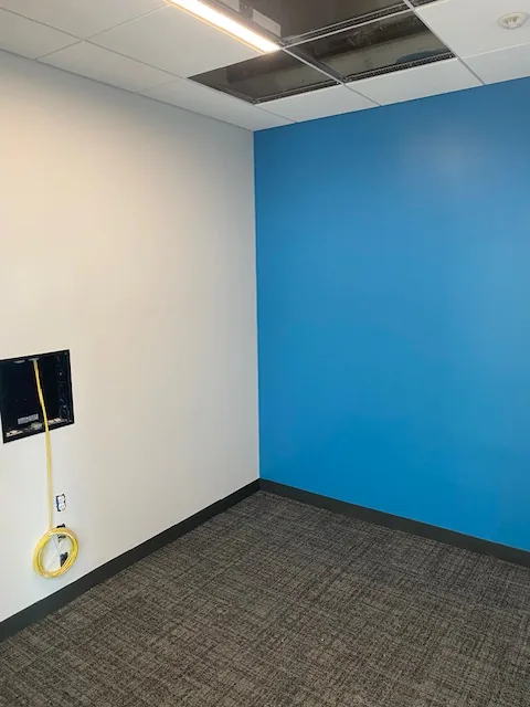 Commercial blue accent wall in progress
